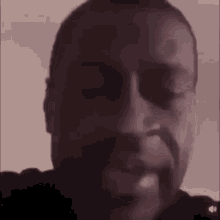 A Close Up Of A Man 'S Face With A Beard And Sunglasses On . GIF