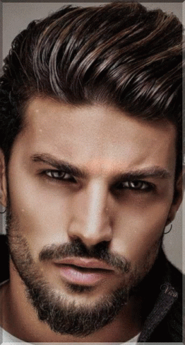 A Close Up Of A Man 'S Face With A Beard And The Name Vince On The Bottom GIF
