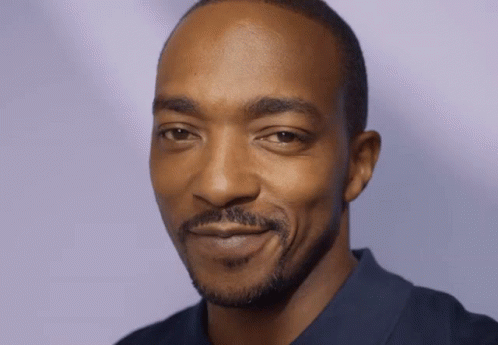 A Close Up Of A Man 'S Face With A Beard GIF
