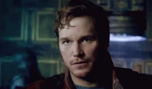 A Close Up Of A Man 'S Face With A Beard Looking At The Camera . GIF