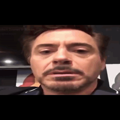 A Close Up Of A Man 'S Face With A Beard GIF