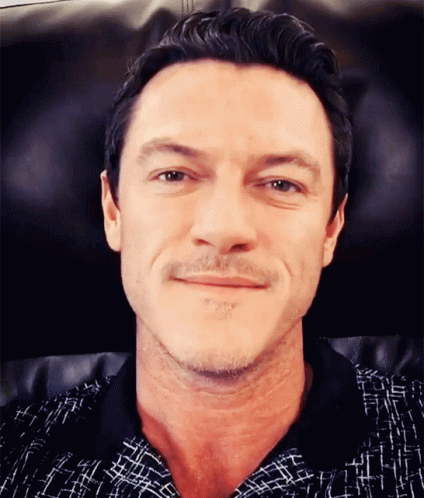A Close Up Of A Man 'S Face With A Beard GIF