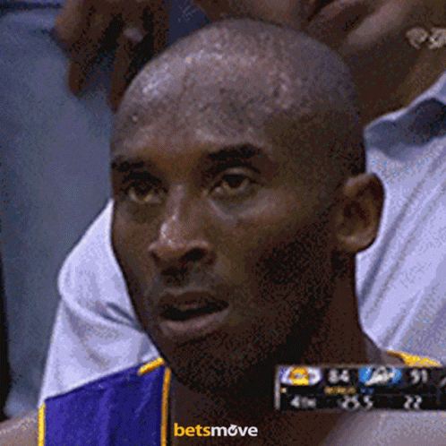 A Close Up Of A Man 'S Face With A Betsmove Logo Behind Him GIF