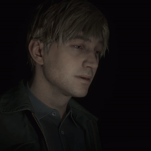 a close up of a man 's face with a black background