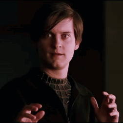 A Close Up Of A Man 'S Face With A Black Jacket On GIF