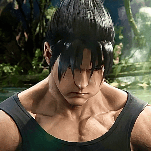 A Close Up Of A Man 'S Face With A Black Tank Top On GIF