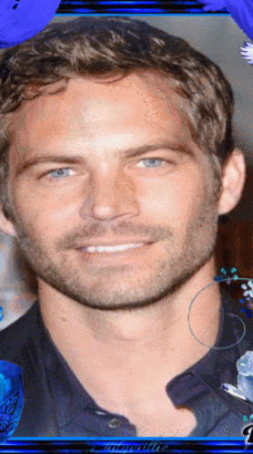 A Close Up Of A Man 'S Face With A Blue Border Around It GIF