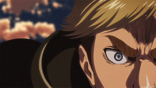 A Close Up Of A Man 'S Face With A Blue Eye And A Cloudy Sky In The Background GIF