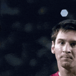 A Close Up Of A Man 'S Face With A Blue Hexagon In The Background GIF