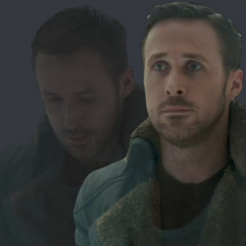 A Close Up Of A Man 'S Face With A Blurred Background GIF