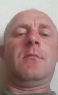 A Close Up Of A Man 'S Face With A Cross On His Forehead GIF