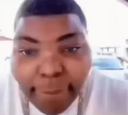 A Close Up Of A Man 'S Face With A Funny Face . GIF