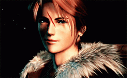 A Close Up Of A Man 'S Face With A Fur Coat Around His Neck GIF