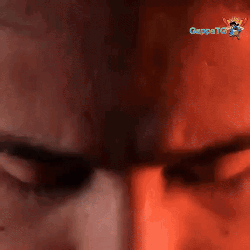A Close Up Of A Man 'S Face With A Gappatg Logo In The Background GIF