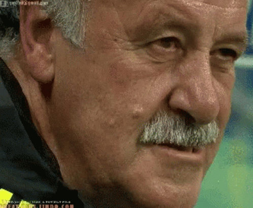 A Close Up Of A Man 'S Face With A Gmail.com Email Address GIF