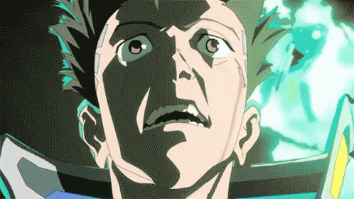 A Close Up Of A Man 'S Face With A Green Background Behind Him GIF