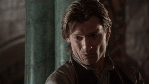 A Close Up Of A Man 'S Face With A Green Pillar In The Background GIF