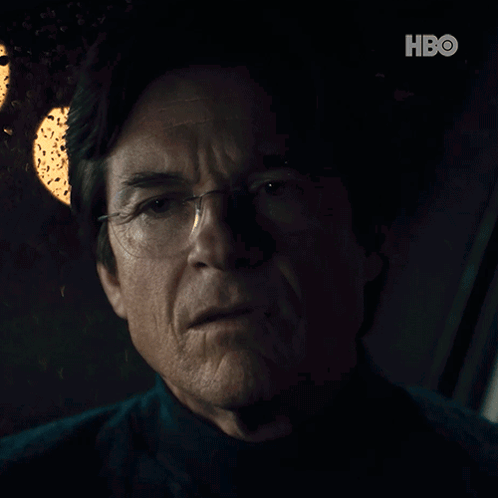 A Close Up Of A Man 'S Face With A Hbo Logo Above Him GIF