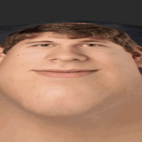 A Close Up Of A Man 'S Face With A Large Chin GIF