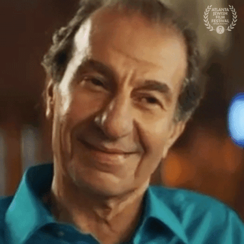 Man's Face With Laurel Wreath GIF