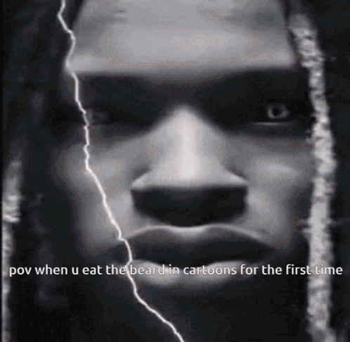 A Close Up Of A Man 'S Face With A Lightning Bolt Behind Him GIF