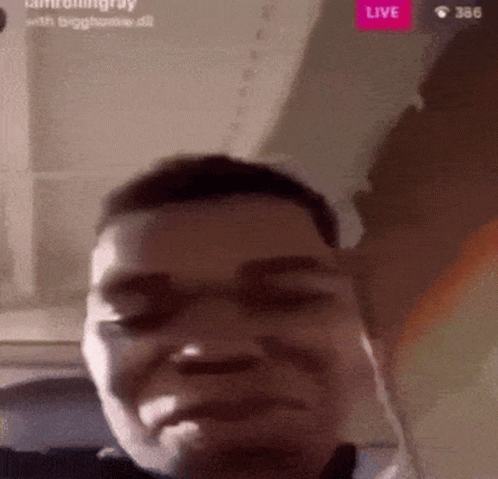 Close Up Of Man's Face With Live Button GIF