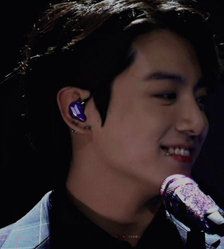 A Close Up Of A Man 'S Face With A Microphone In Front Of Him And A Watermark That Says Tumblr GIF