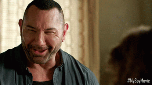 A Close Up Of A Man 'S Face With A #Myspymovie Watermark GIF