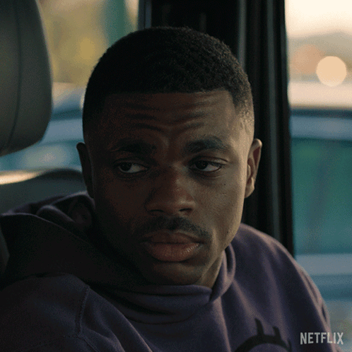 A Close Up Of A Man 'S Face With A Netflix Logo On The Bottom GIF