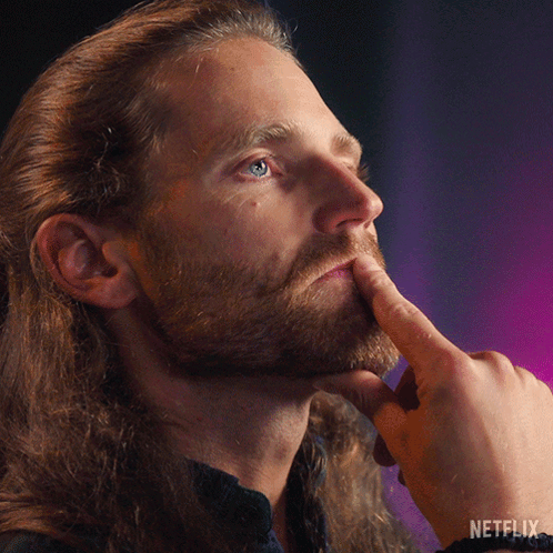 A Close Up Of A Man 'S Face With A Netflix Logo On The Bottom Right GIF
