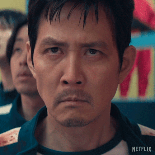 A Close Up Of A Man 'S Face With A Netflix Logo On The Bottom Right GIF