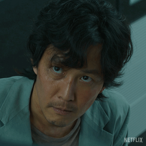A Close Up Of A Man 'S Face With A Netflix Logo On The Bottom GIF