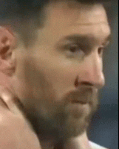 A Close Up Of A Man 'S Face With A Nose Ring GIF