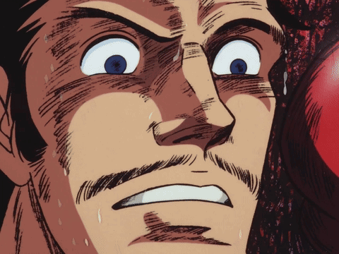 Man's Face With Red Boxing Glove GIF