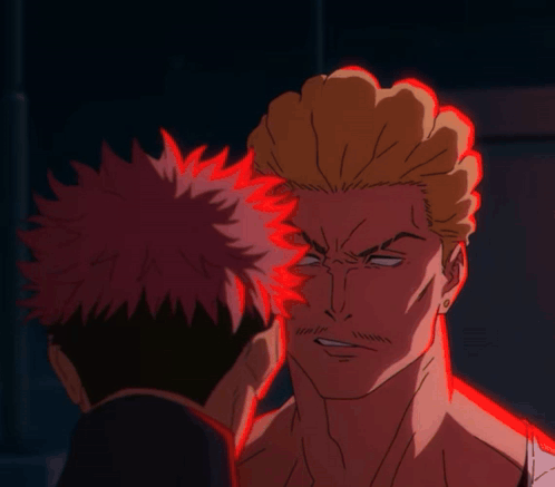 A Close Up Of A Man 'S Face With A Red Glow Around It GIF