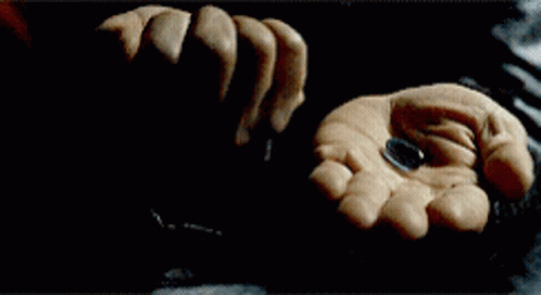 A Close Up Of A Man 'S Face With A Reflection Of A Woman GIF
