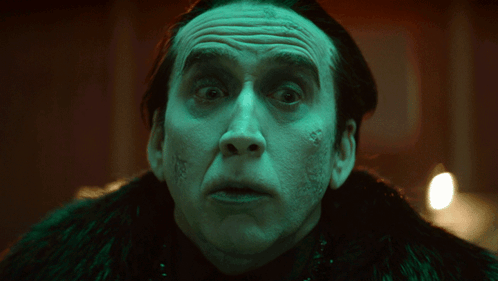 A Close Up Of A Man 'S Face With A Scar On His Face GIF