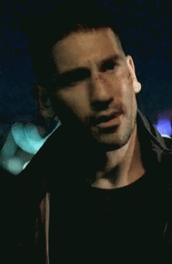 A Close Up Of A Man 'S Face With A Scratch On It GIF