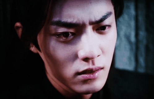 A Close Up Of A Man 'S Face With A Serious Expression GIF