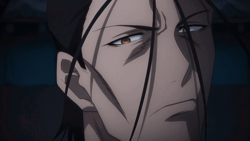 A Close Up Of A Man 'S Face With A Serious Look On His Face GIF