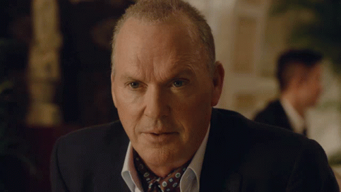 A Close Up Of A Man 'S Face With A Serious Look On His Face GIF