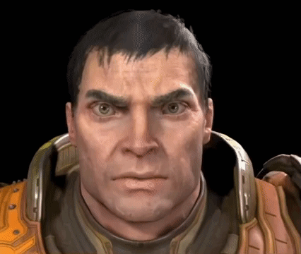A Close Up Of A Man 'S Face With A Serious Look On His Face . GIF