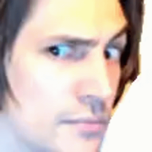 Close Up Of Man's Serious Face GIF