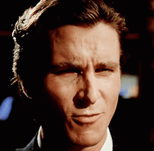 A Close Up Of A Man 'S Face With A Serious Look On It GIF