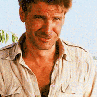 A Close Up Of A Man 'S Face With A Shirt Off GIF