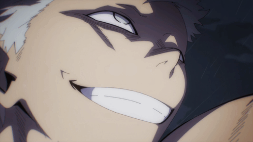 A Close Up Of A Man 'S Face With A Smile On It GIF