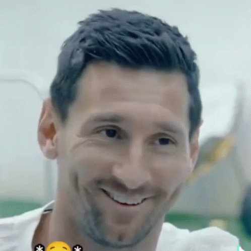 A Close Up Of A Man 'S Face With A Smile GIF