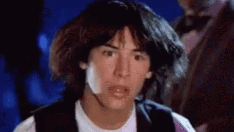 A Close Up Of A Man 'S Face With A Surprised Look On It . GIF
