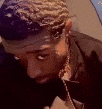 A Close Up Of A Man 'S Face With A Tear Running Down His Face GIF