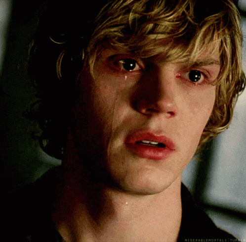 A Close Up Of A Man 'S Face With A Tear Running Down His Face GIF